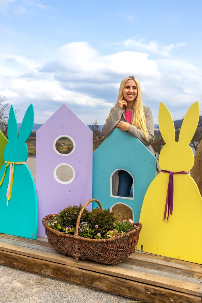 Easter market Schloss Hof near Vienna, Easter decoration, colorful houses and Easter bunnies.